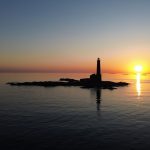 Bengtskär lighthouse in Finland at sunset