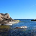 View of a small bay in the Baltic sea surrounded by granite cliffs